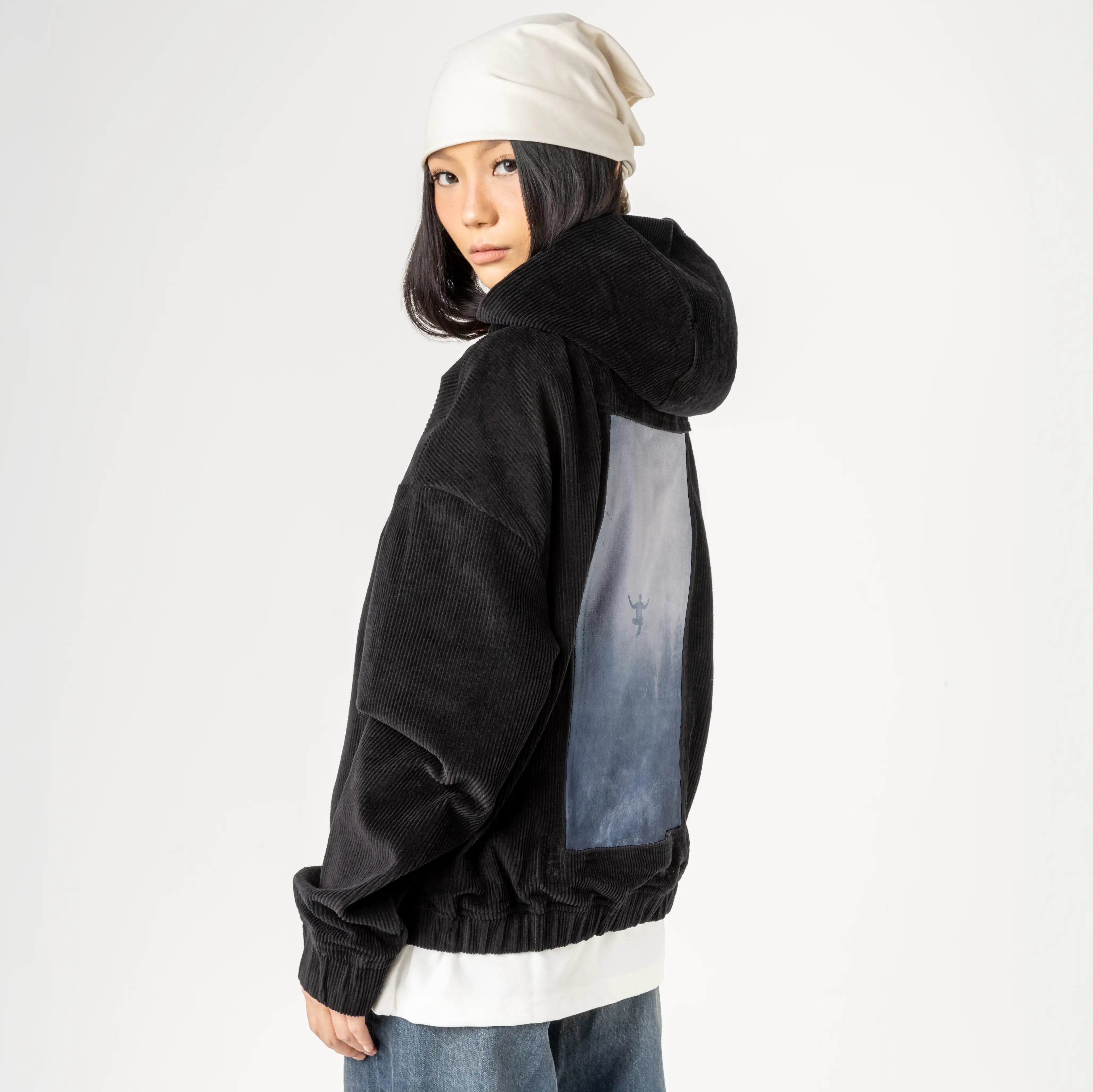 innerpeace patch on female retro cord hoodie in onyx
