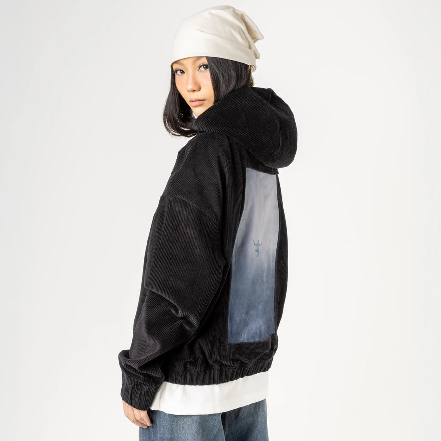 innerpeace patch on female retro cord hoodie in onyx