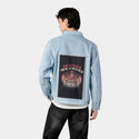 inpizzawecrust patch on male og denim jacket in oceanside