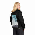 jaggedpeaks patch on female og denim jacket in raven