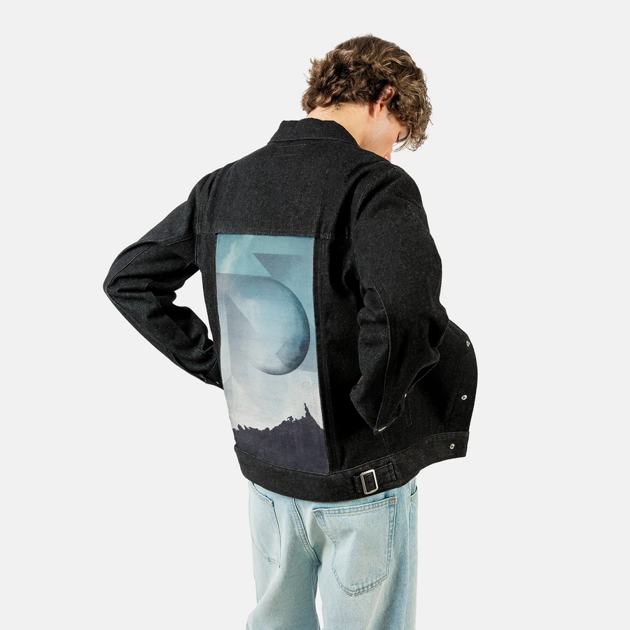 jaggedpeaks patch on male og denim jacket in raven