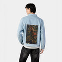 journeytotheinnerworld patch on male og denim jacket in oceanside