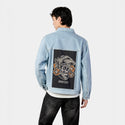justice patch on male og denim jacket in oceanside