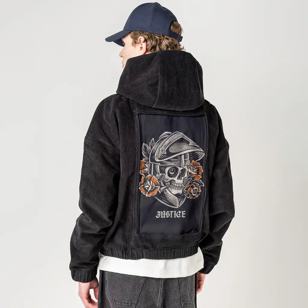justice patch on male retro cord hoodie in onyx