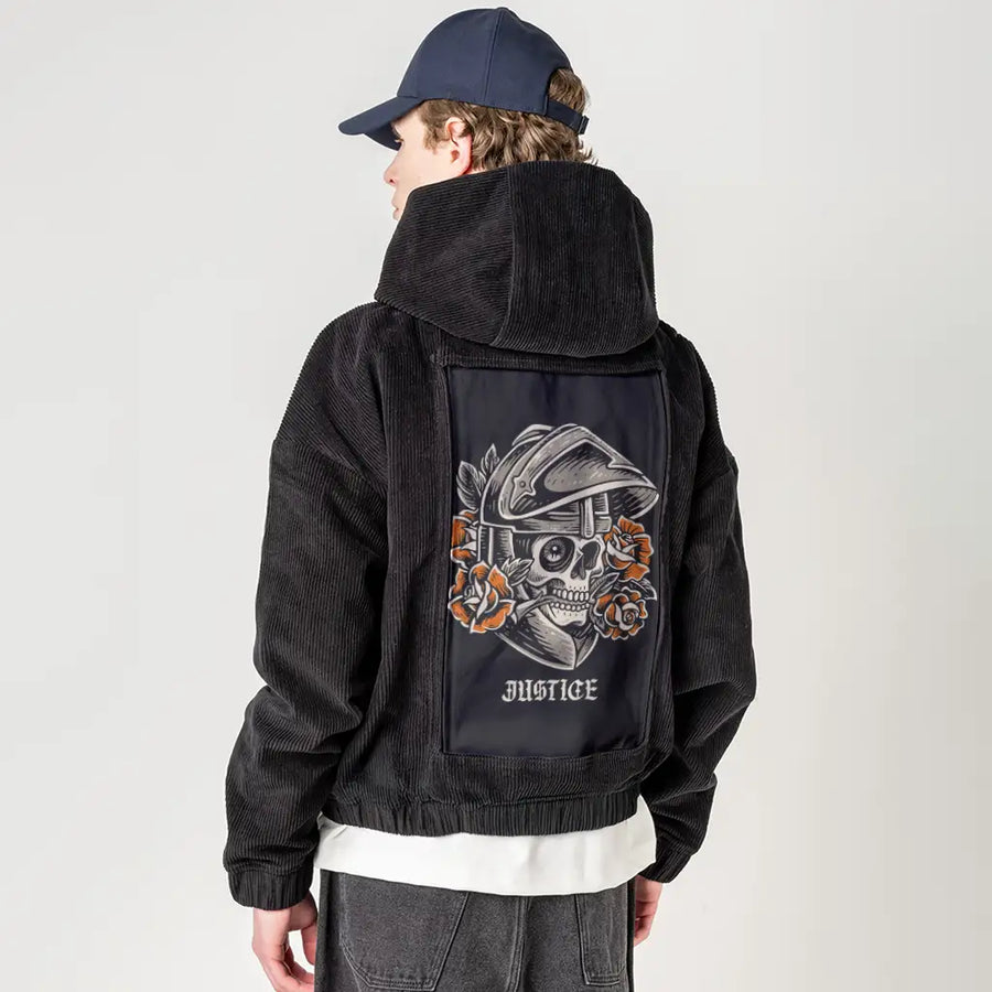 justice patch on male retro cord hoodie in onyx