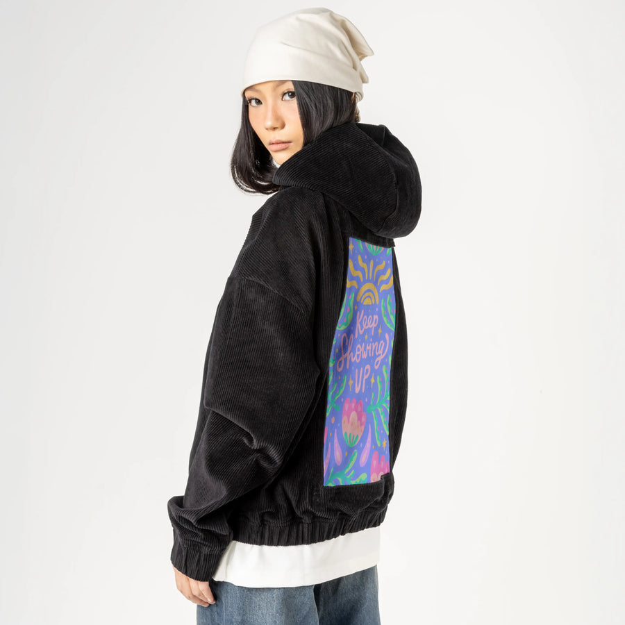 keepshowingup patch on female retro cord hoodie in onyx