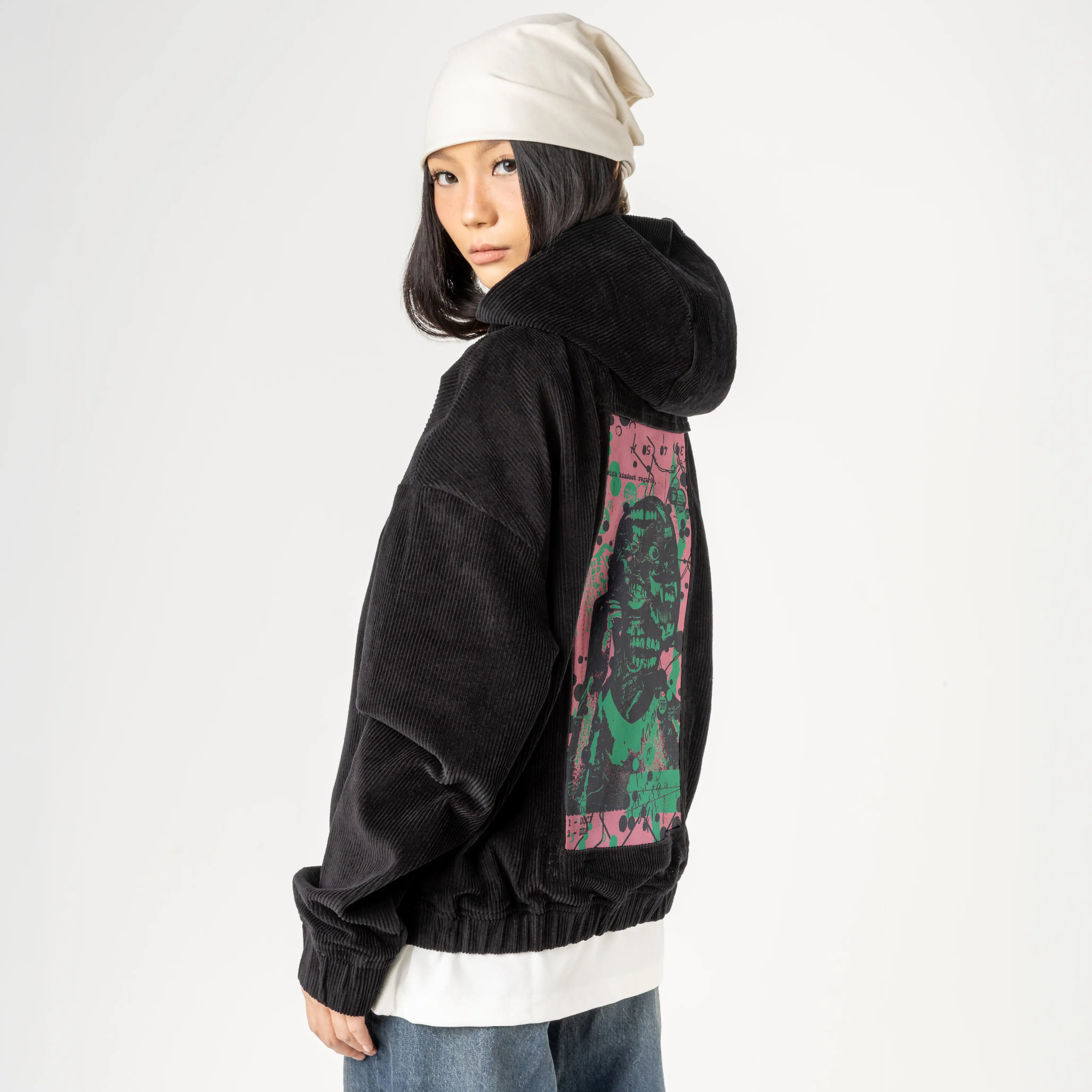 kindestregards patch on female retro cord hoodie in onyx