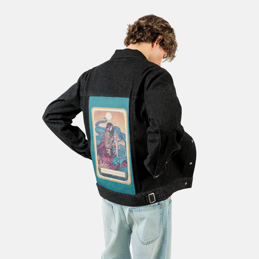 knightofswords patch on male og denim jacket in raven