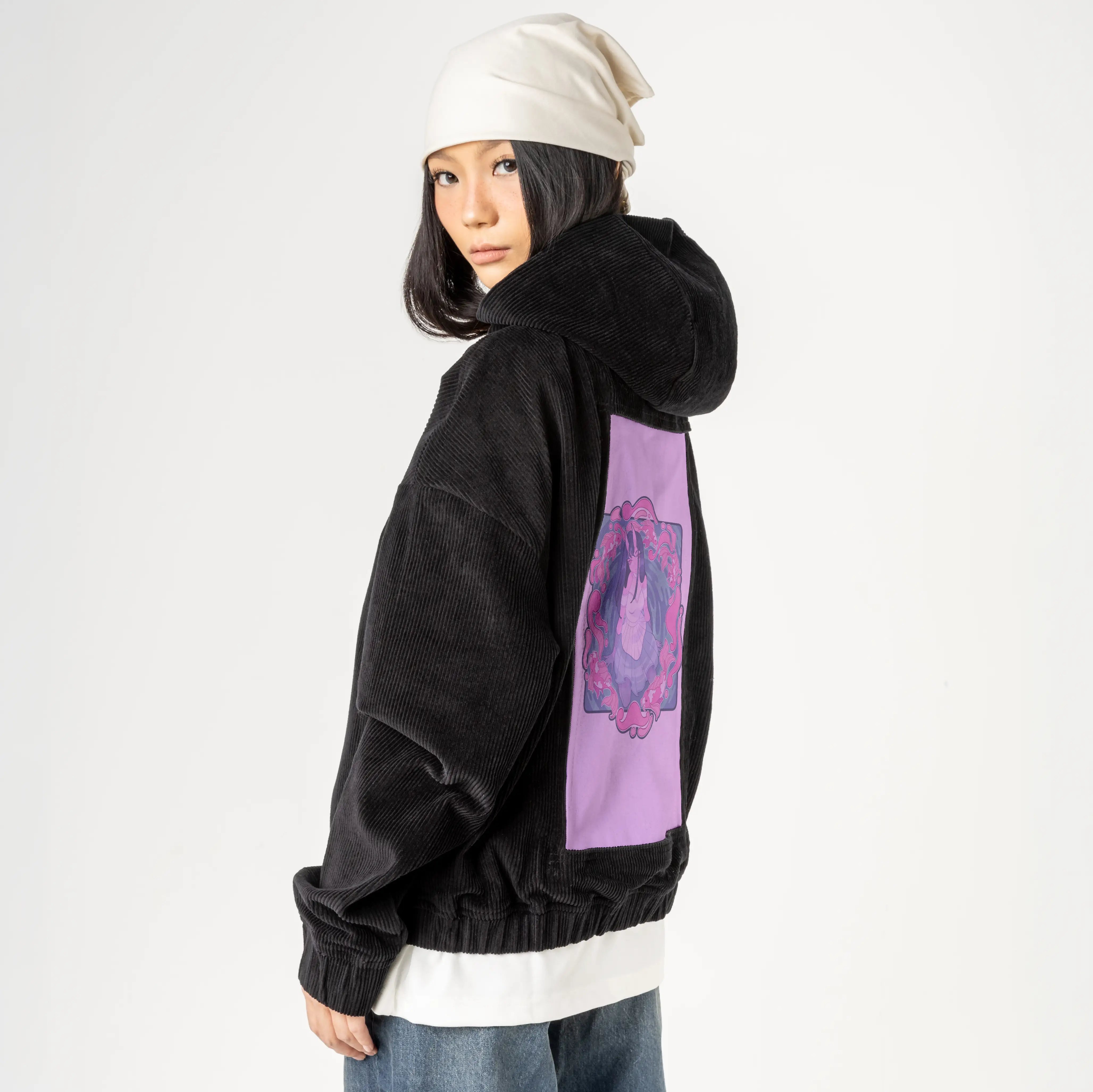 koi patch on female retro cord hoodie in onyx