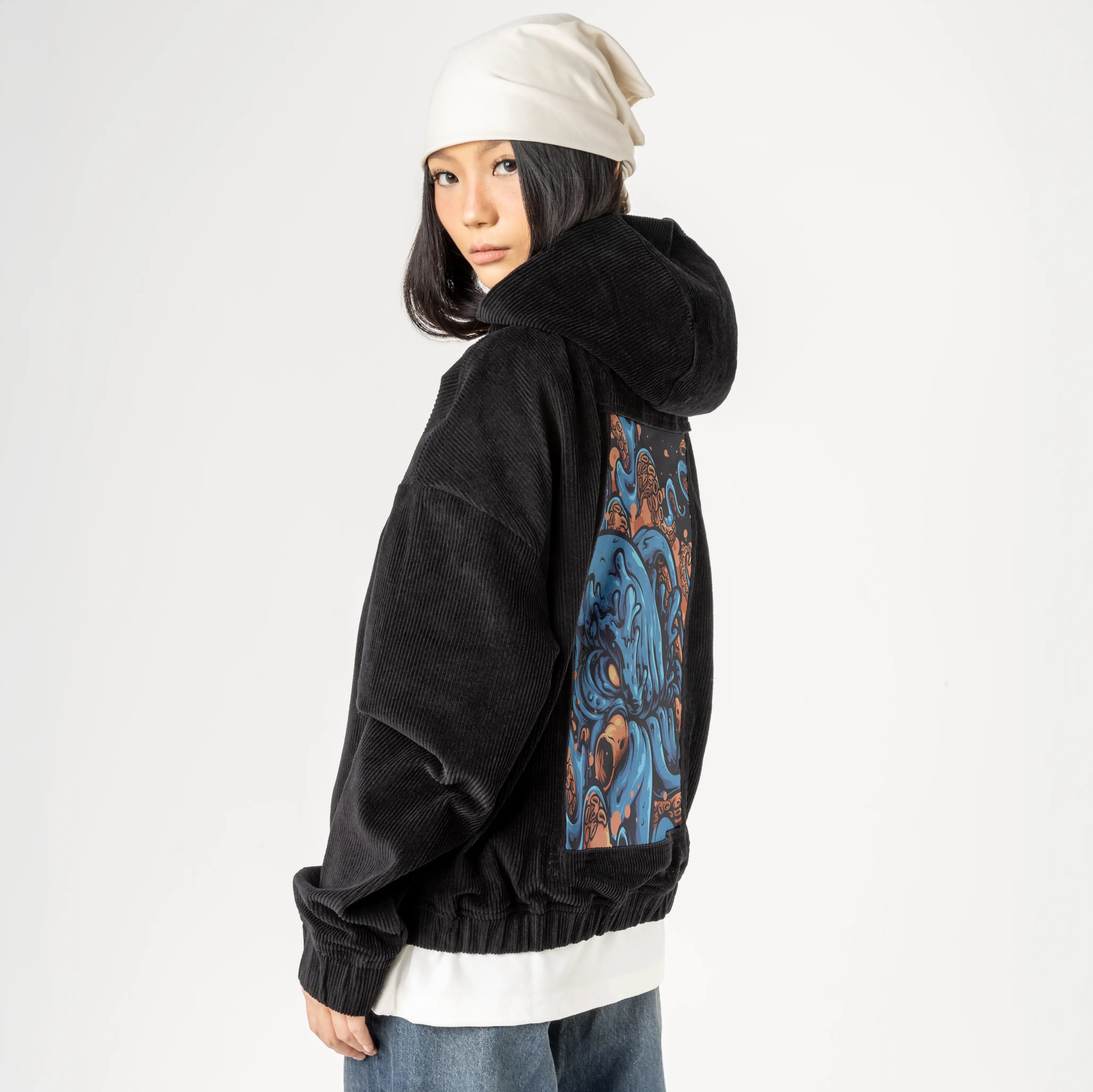 kraken patch on female retro cord hoodie in onyx