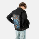 kraken patch on male og denim jacket in raven