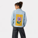 laflor patch on female og denim jacket in oceanside