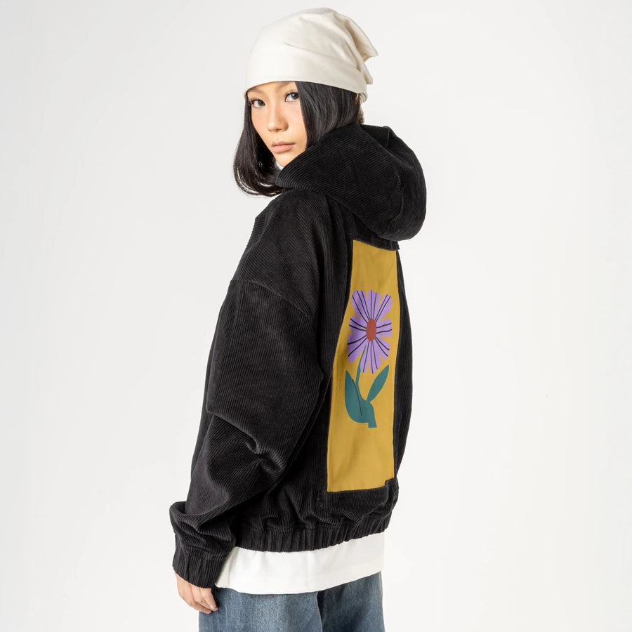 laflor patch on female retro cord hoodie in onyx