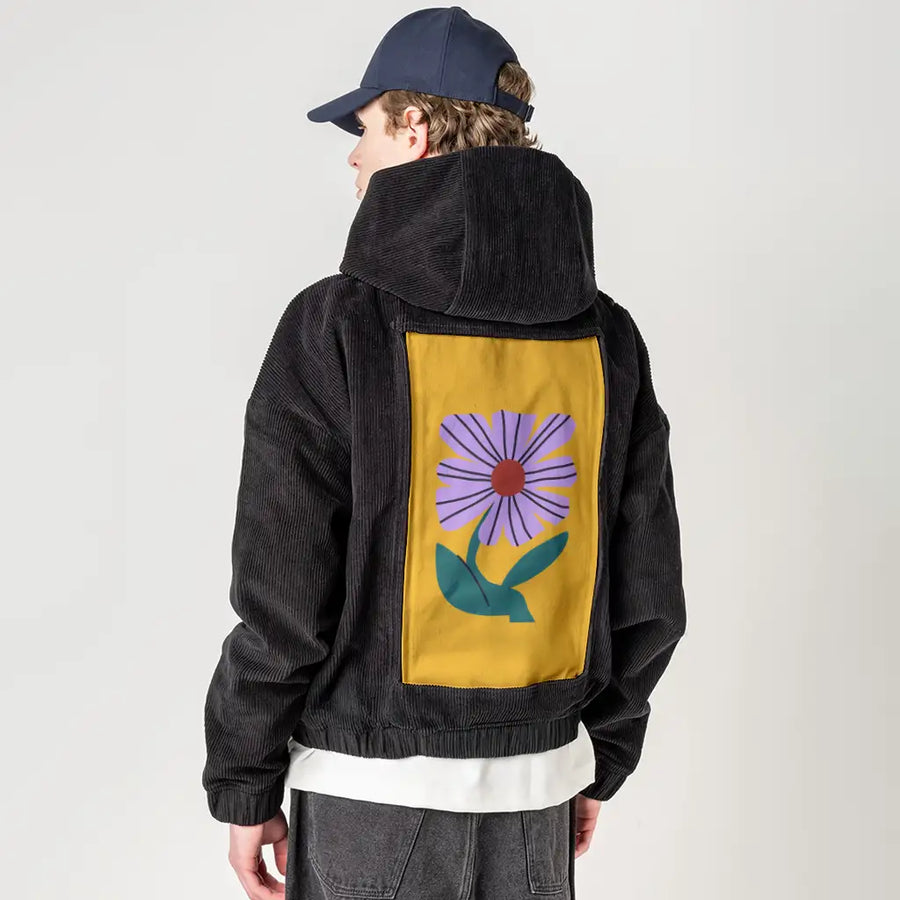 laflor patch on male retro cord hoodie in onyx