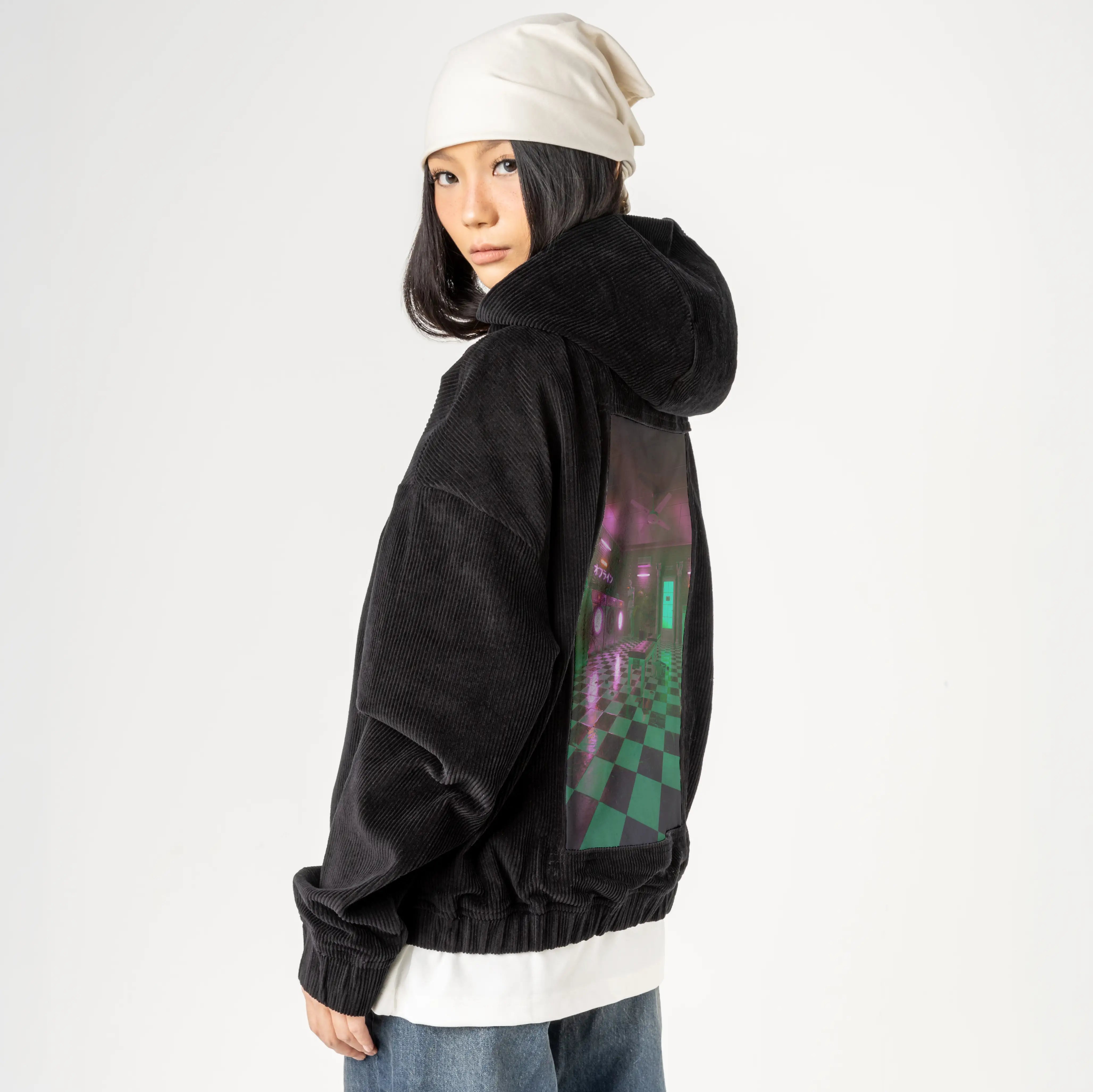 laundromat patch on female retro cord hoodie in onyx
