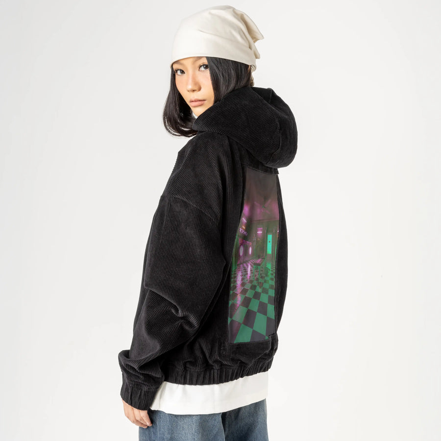 laundromat patch on female retro cord hoodie in onyx