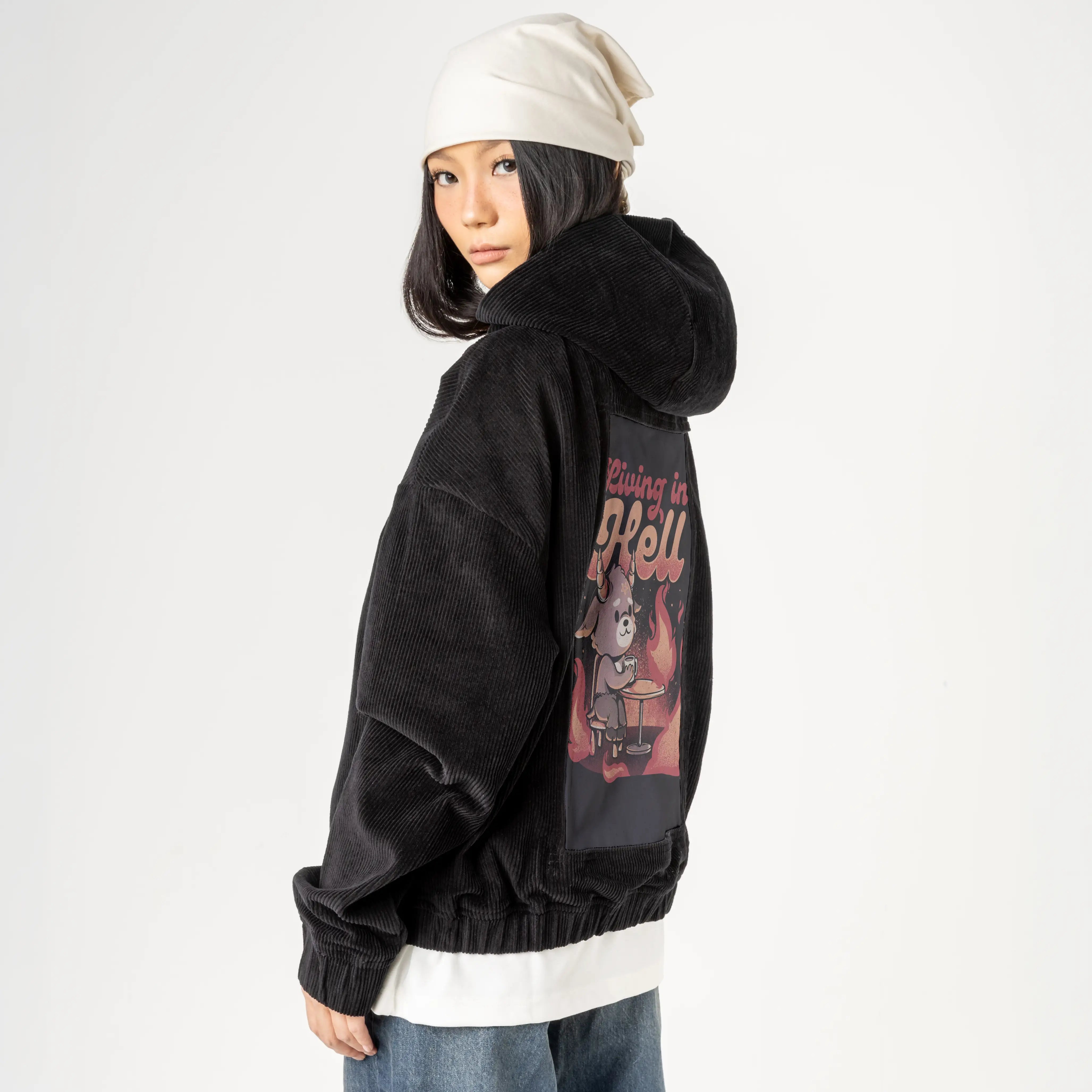 livinginhell patch on female retro cord hoodie in onyx