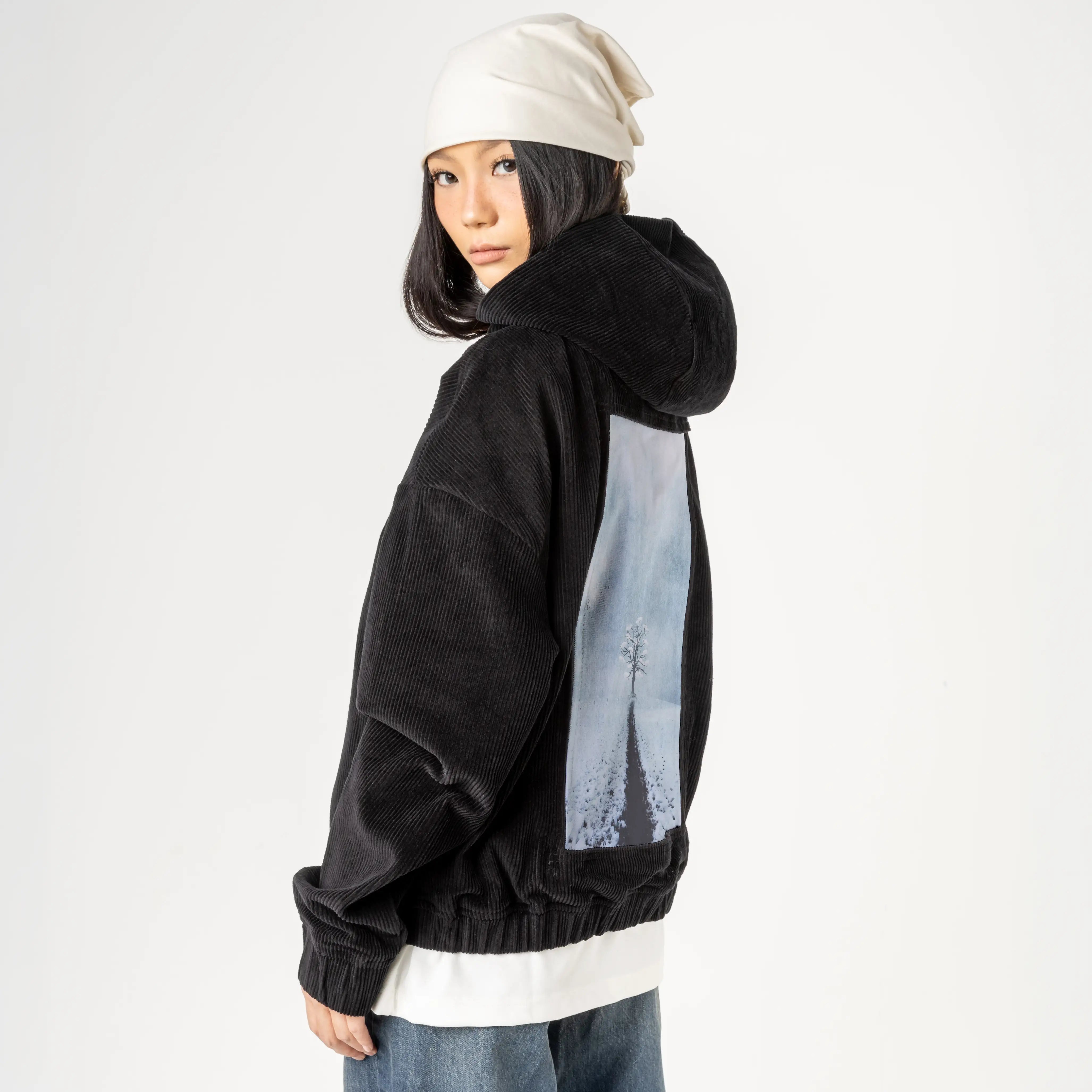 lonetreeinwinter patch on female retro cord hoodie in onyx