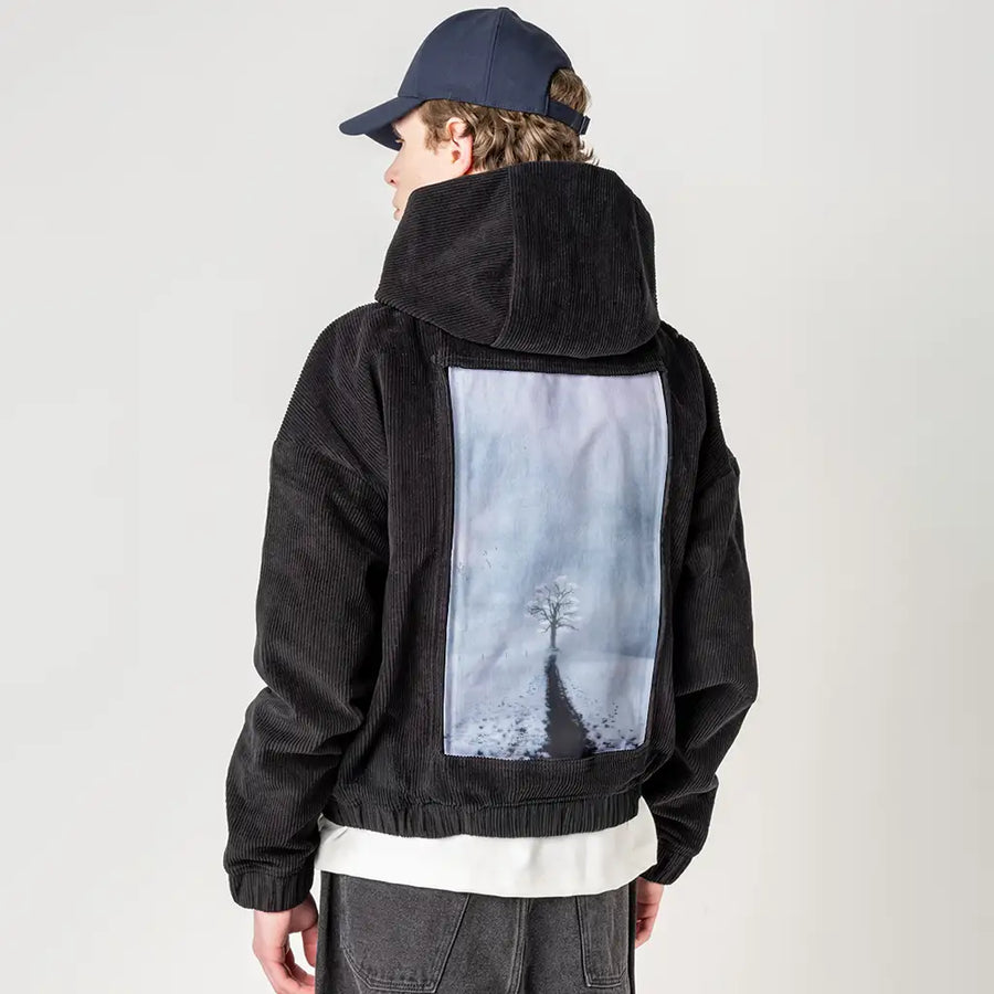 lonetreeinwinter patch on male retro cord hoodie in onyx