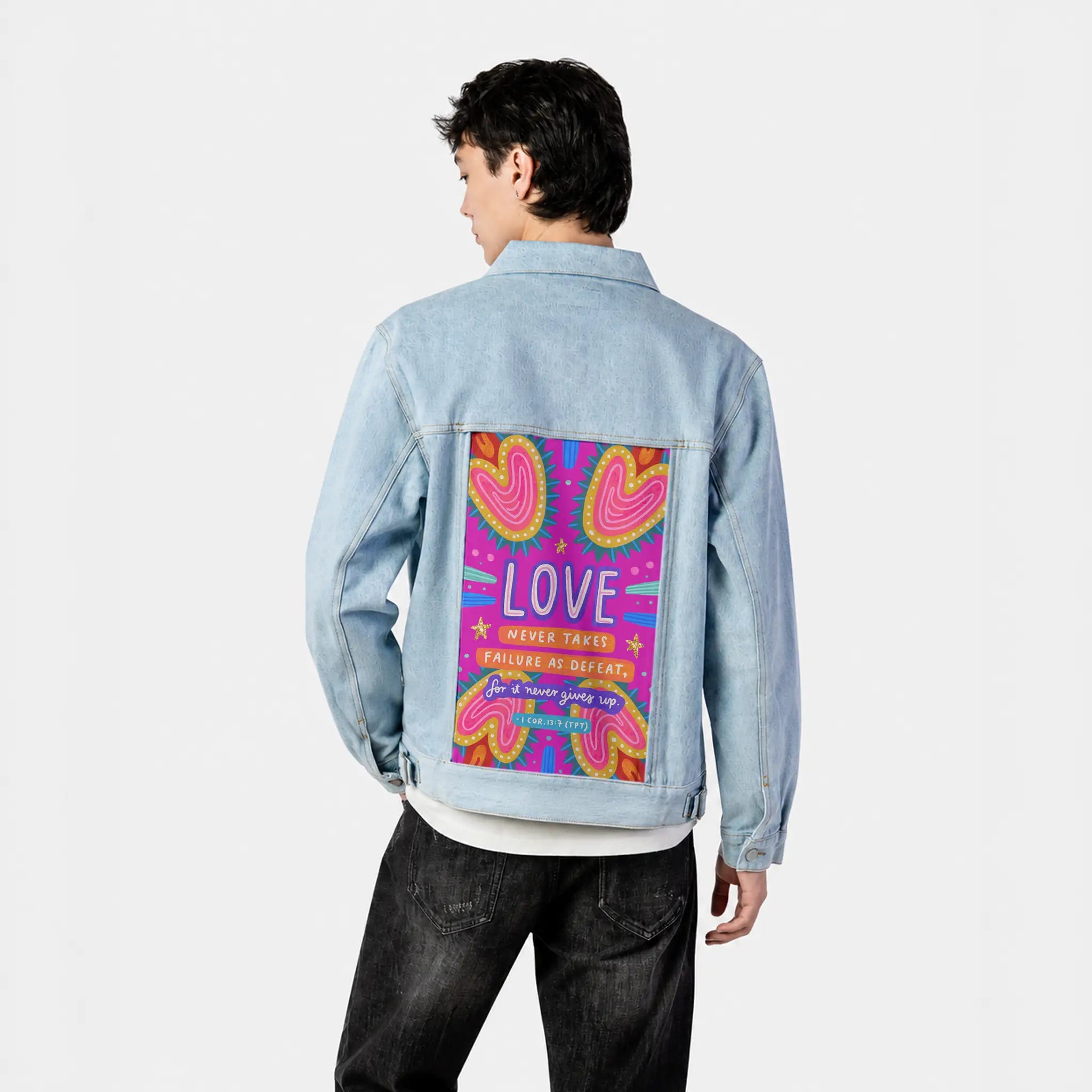 lovenevergivesup patch on male og denim jacket in oceanside