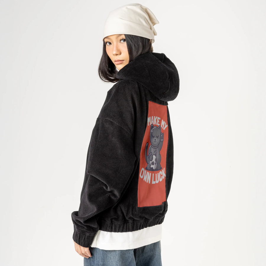 makemyownluck patch on female retro cord hoodie in onyx