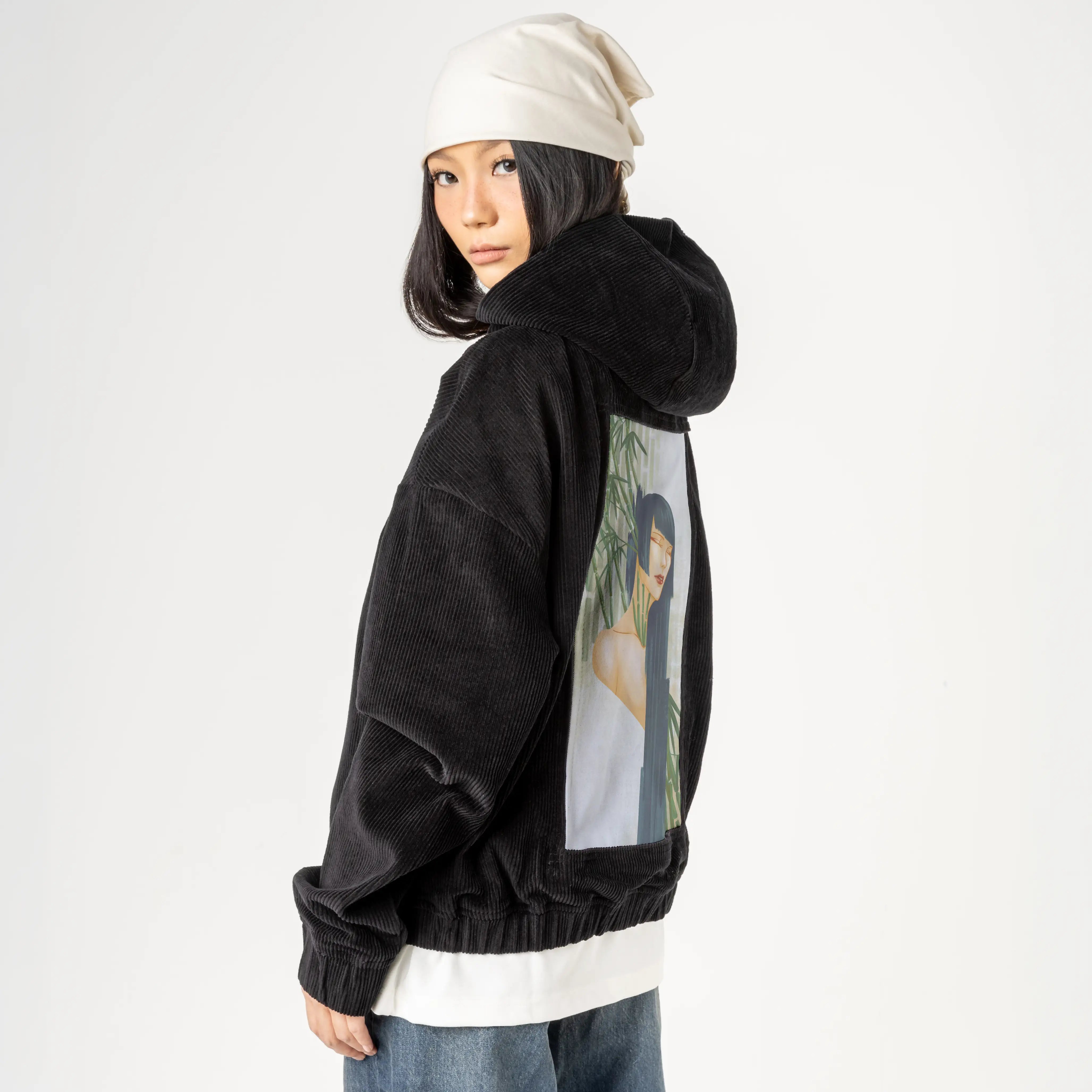 mambumuse patch on female retro cord hoodie in onyx