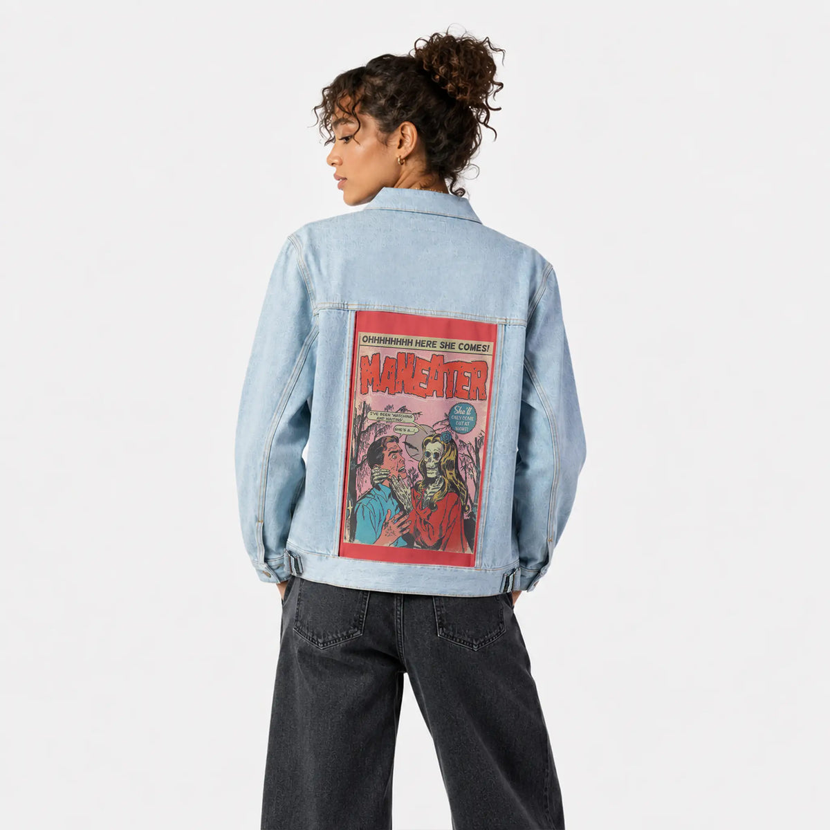 maneater patch on female og denim jacket in oceanside
