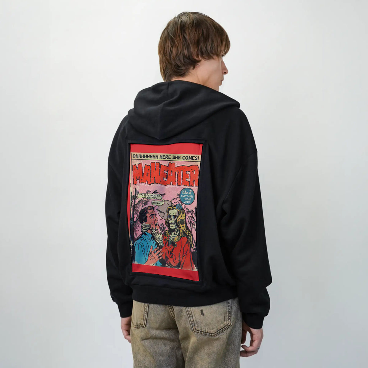 maneater patch on male essential zip hoodie in after hours