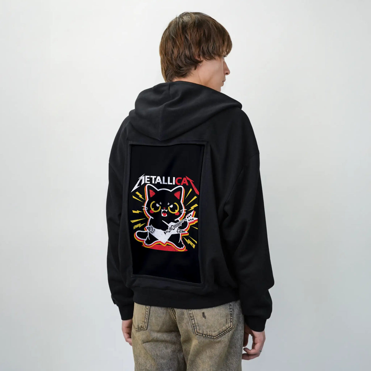 metallicat patch on male essential zip hoodie in after hours