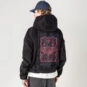 moth patch on male retro cord hoodie in onyx