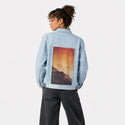 mountainsonmars patch on female og denim jacket in oceanside