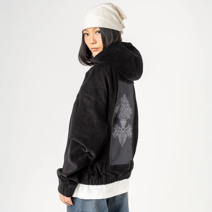 murgaii patch on female retro cord hoodie in onyx