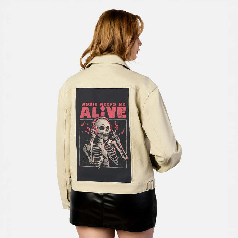 musickeepsmealive patch on female atelier canvas jacket in tan