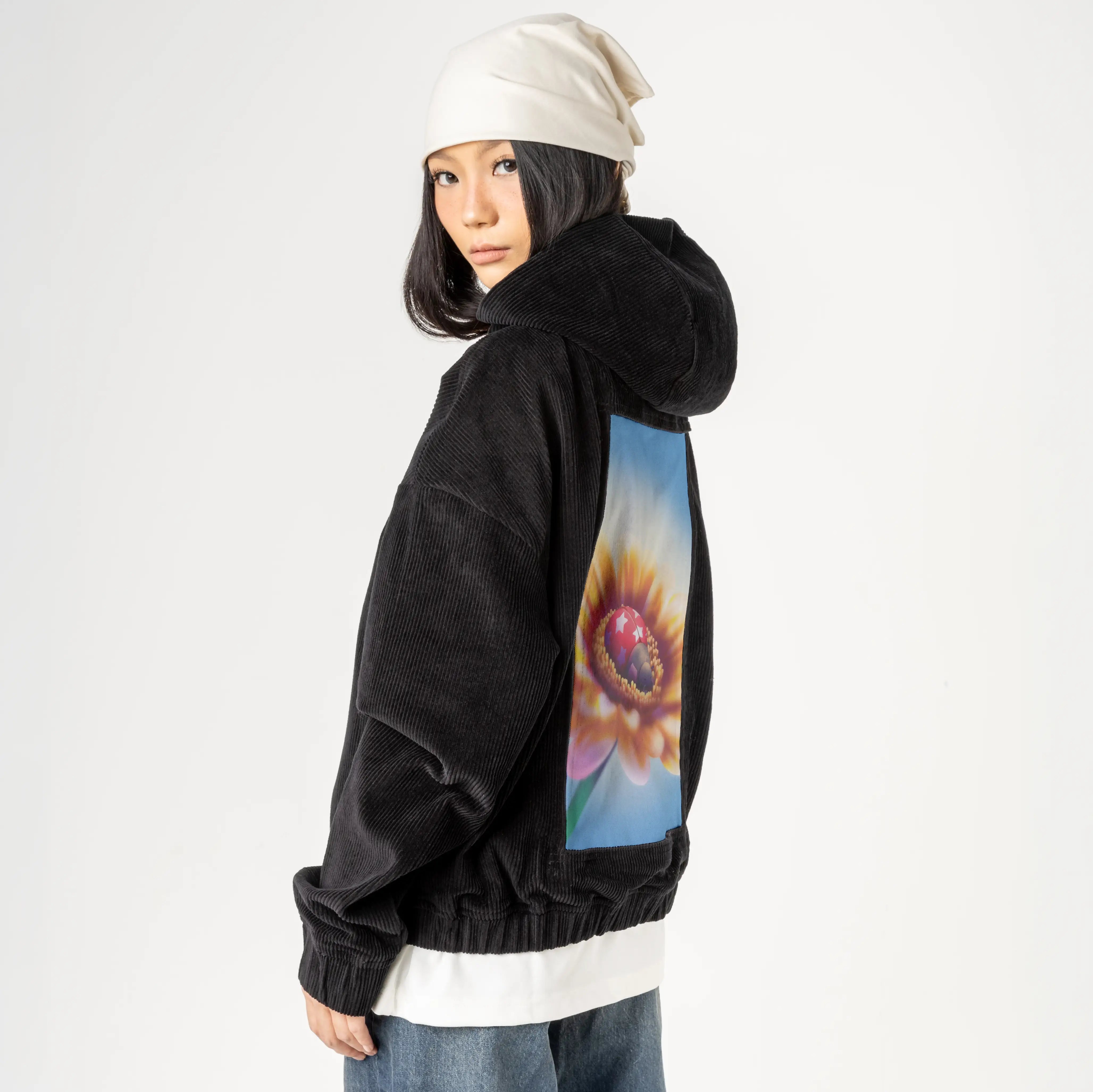 naptime patch on female retro cord hoodie in onyx