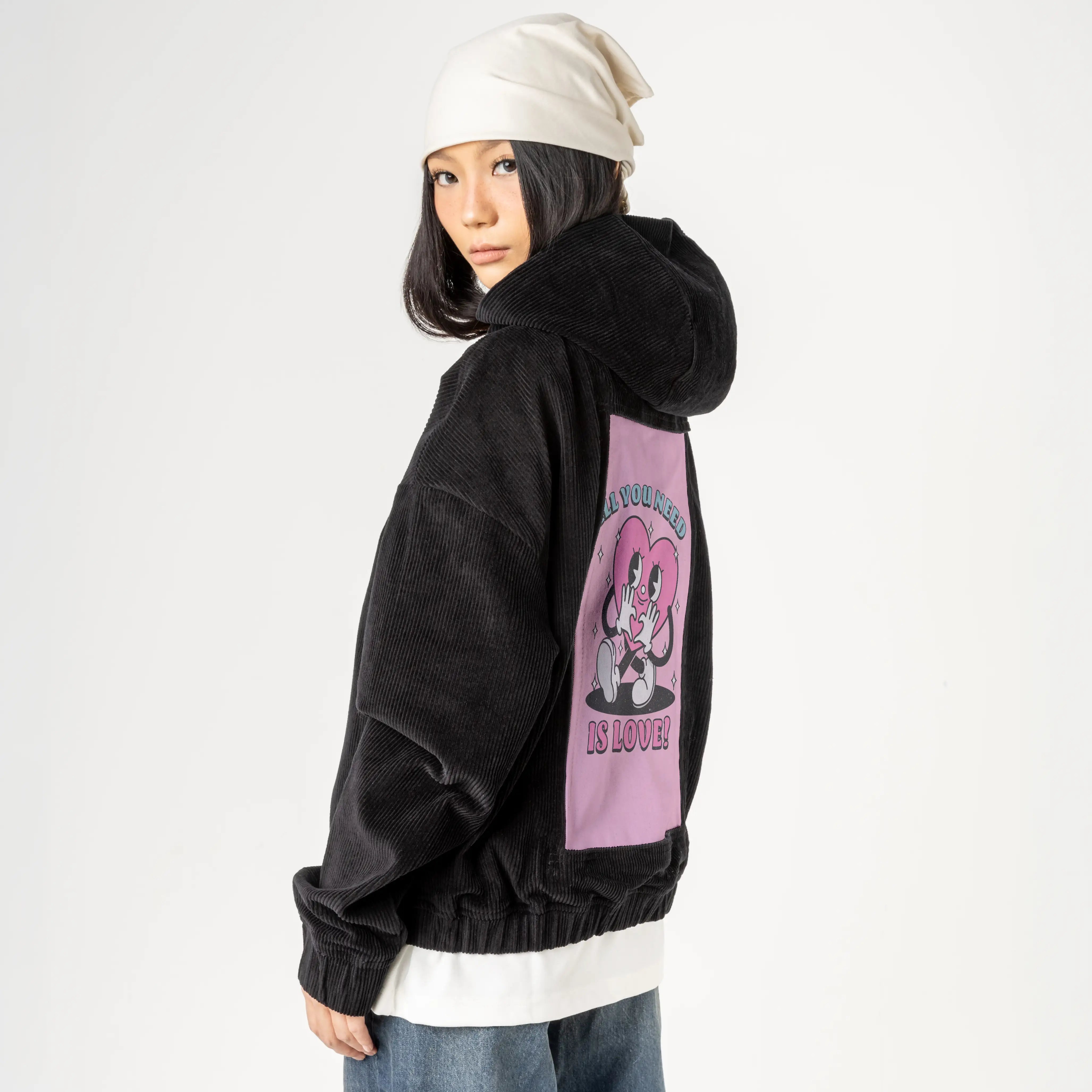 needinglove patch on female retro cord hoodie in onyx