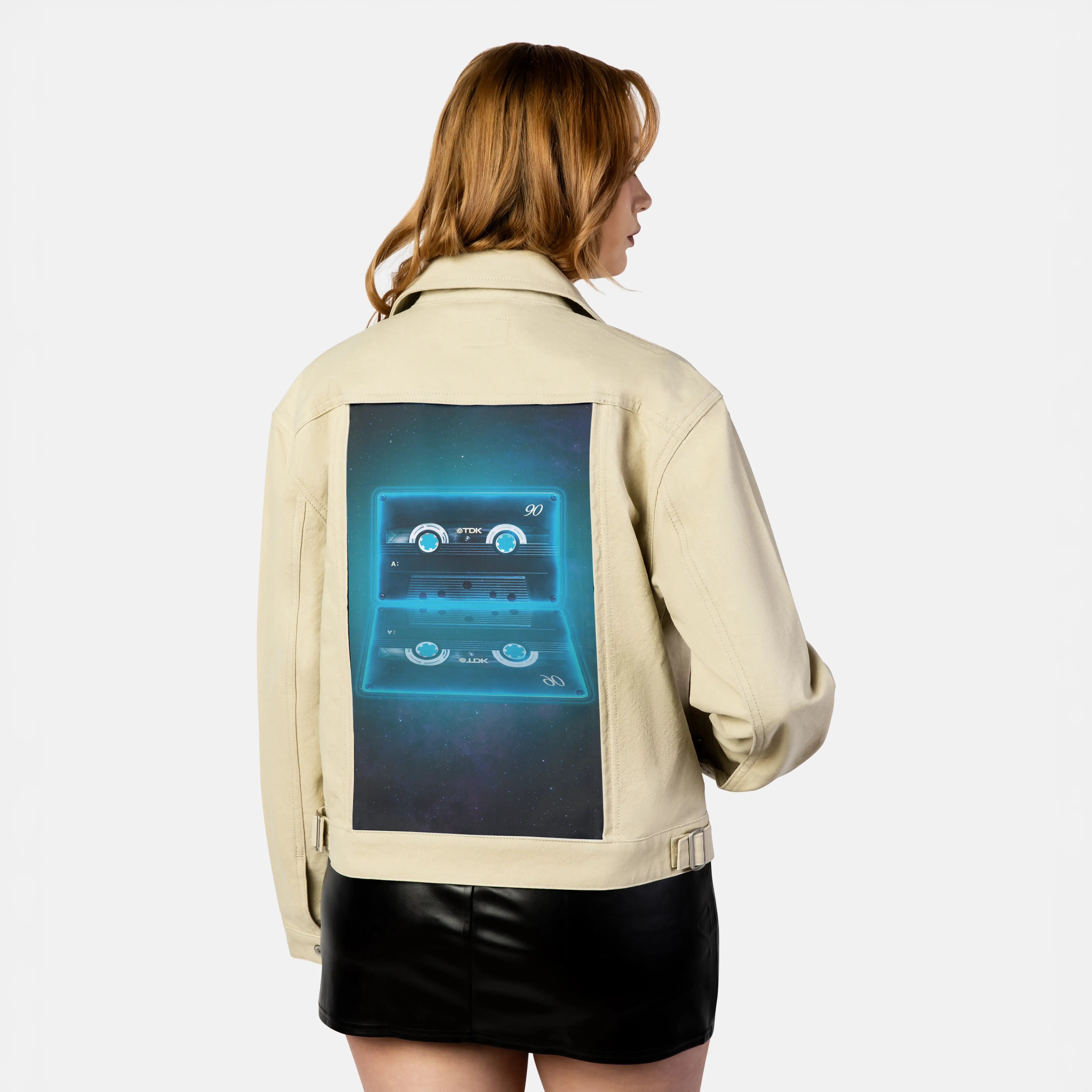neoncassette patch on female atelier canvas jacket in tan