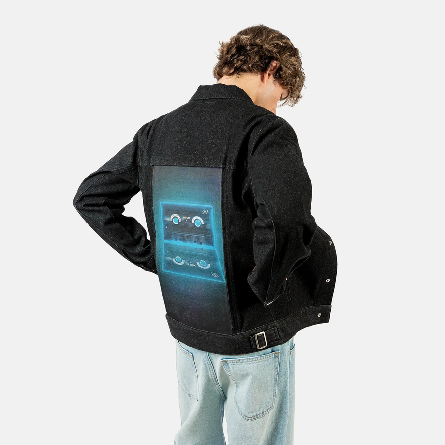neoncassette patch on male og denim jacket in raven