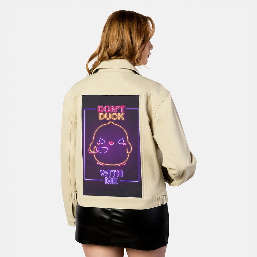 neondontduckwithme patch on female atelier canvas jacket in tan