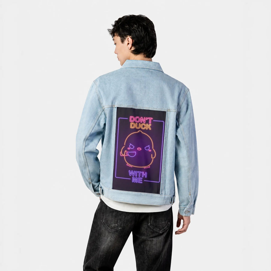 neondontduckwithme patch on male og denim jacket in oceanside