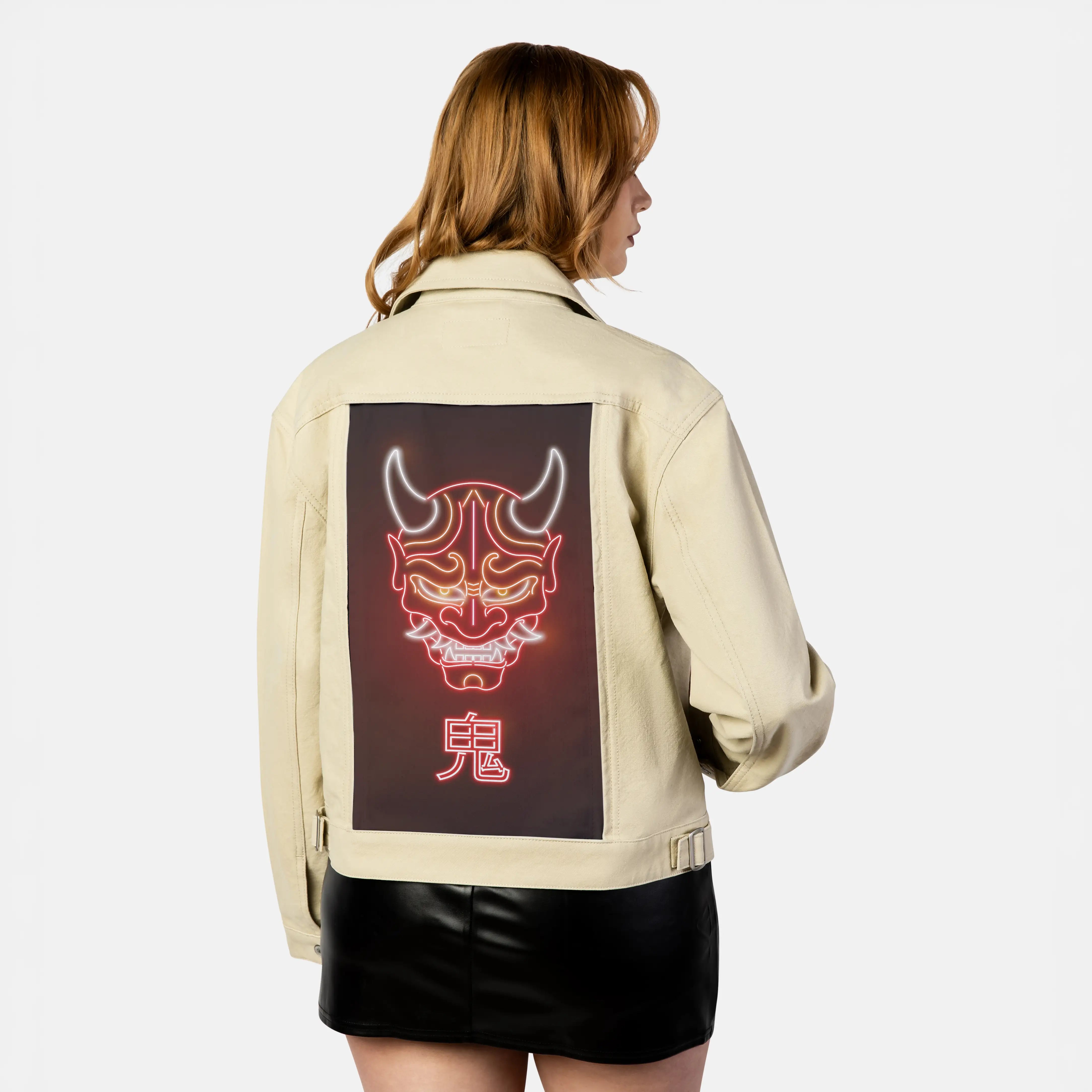 neononimask patch on female atelier canvas jacket in tan