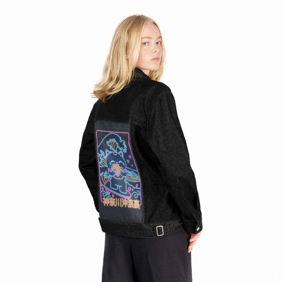 neonretronekosurfing patch on female og denim jacket in raven