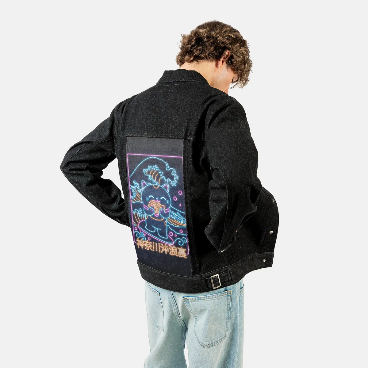 neonretronekosurfing patch on male og denim jacket in raven