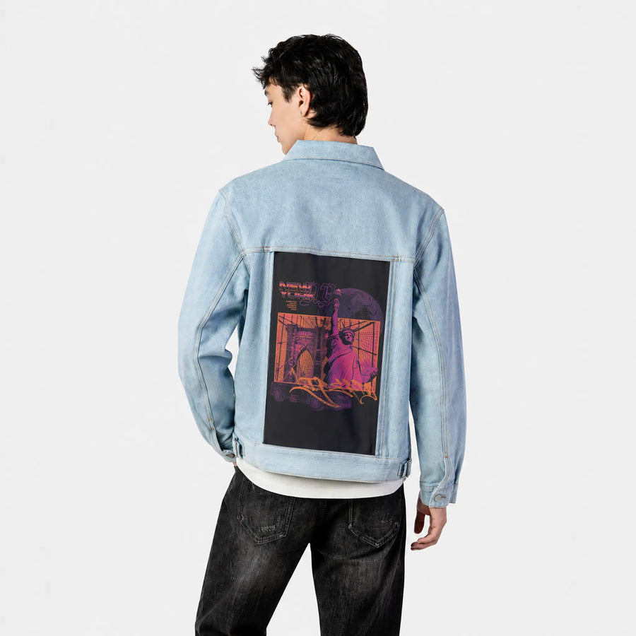 neversleeps patch on male og denim jacket in oceanside