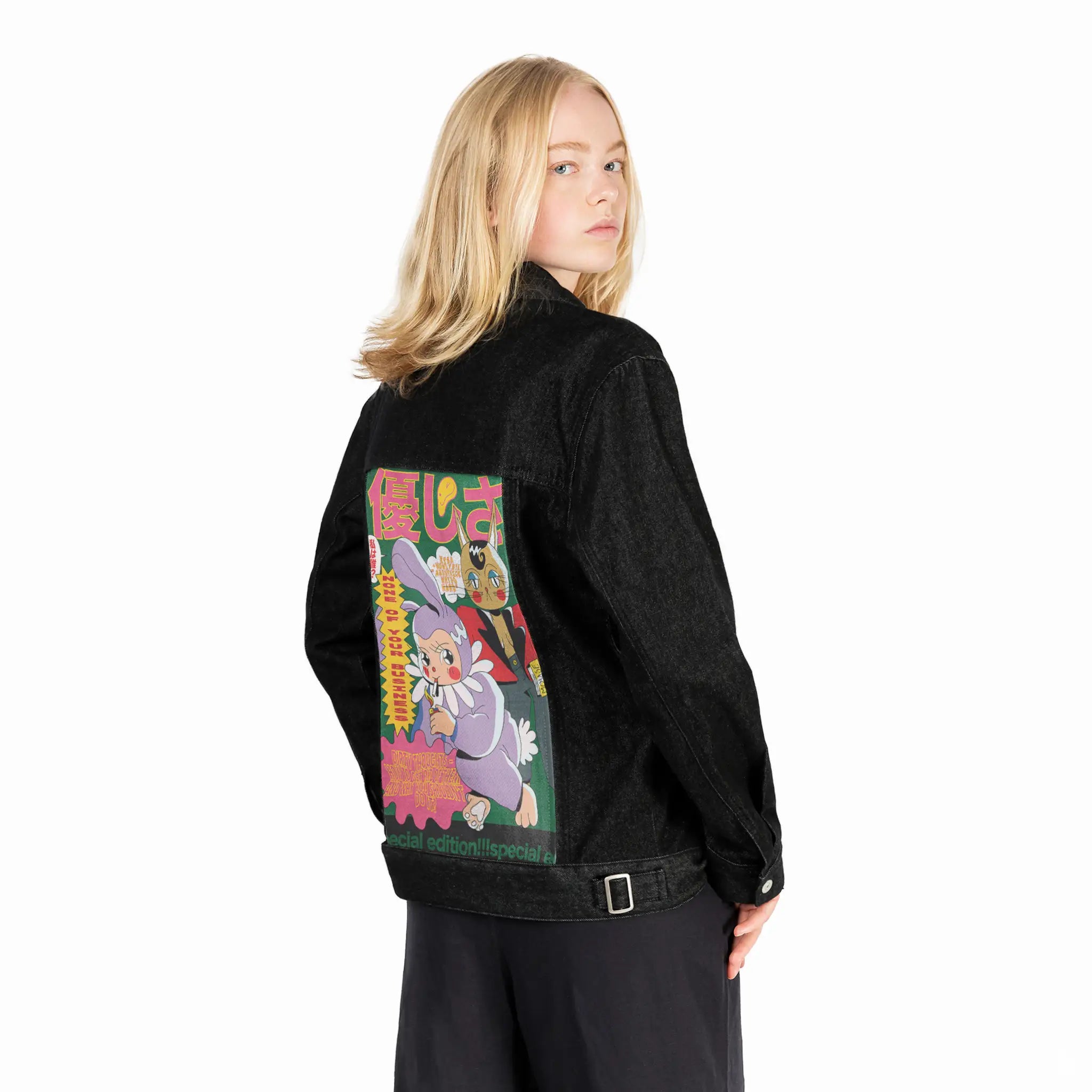 noneofyourbusiness patch on female og denim jacket in raven