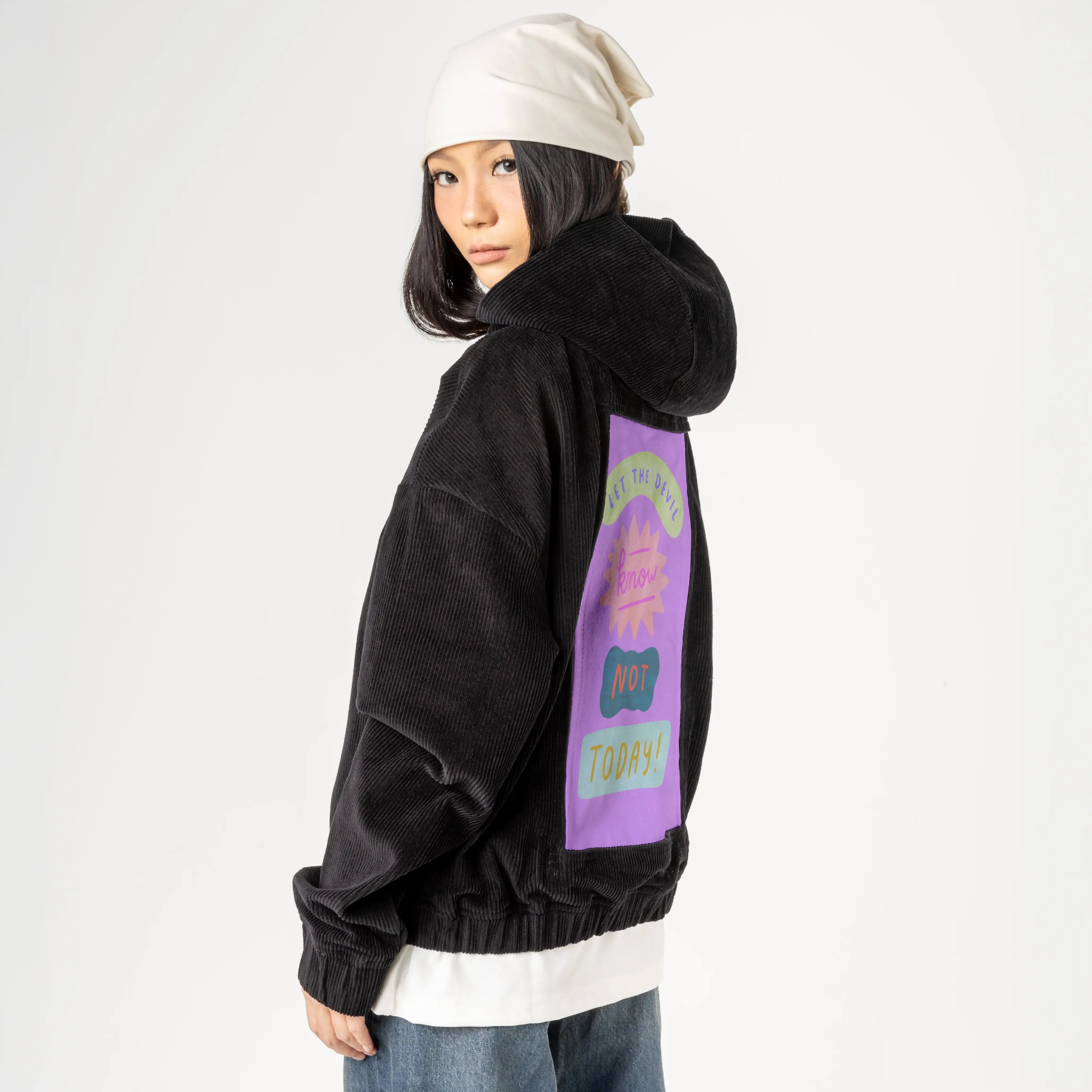 nottoday patch on female retro cord hoodie in onyx