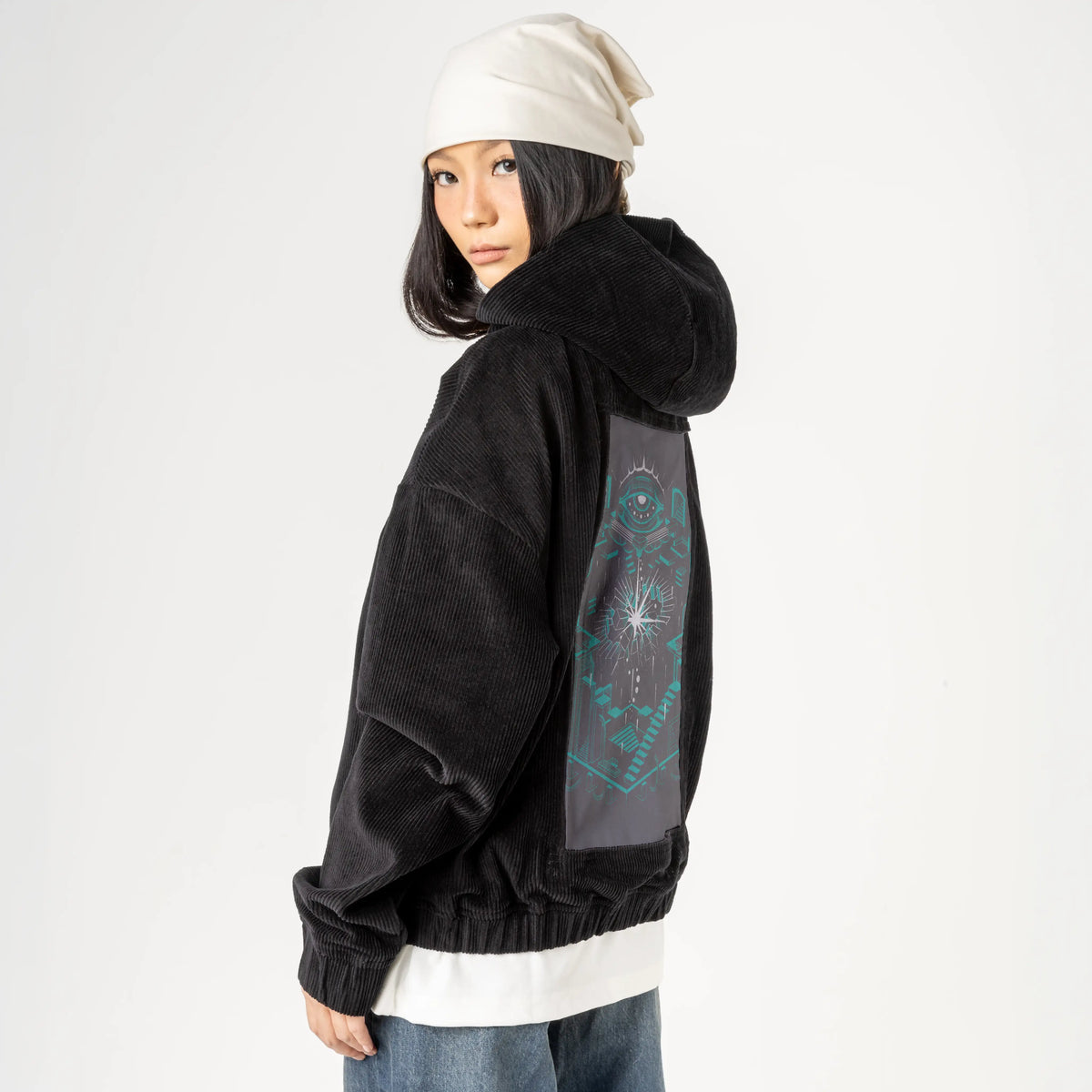 oblivion patch on female retro cord hoodie in onyx