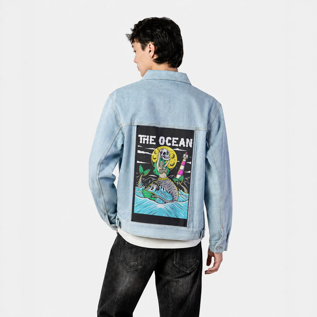 ocean patch on male og denim jacket in oceanside