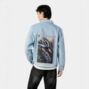 ofthewild patch on male og denim jacket in oceanside