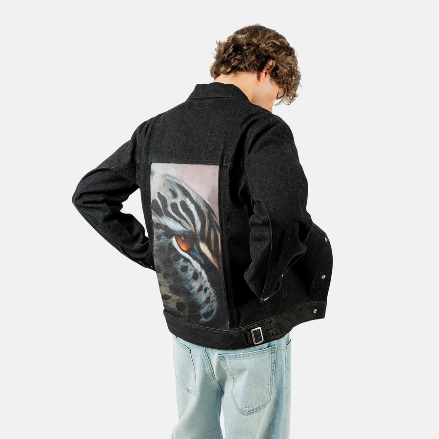 ofthewild patch on male og denim jacket in raven