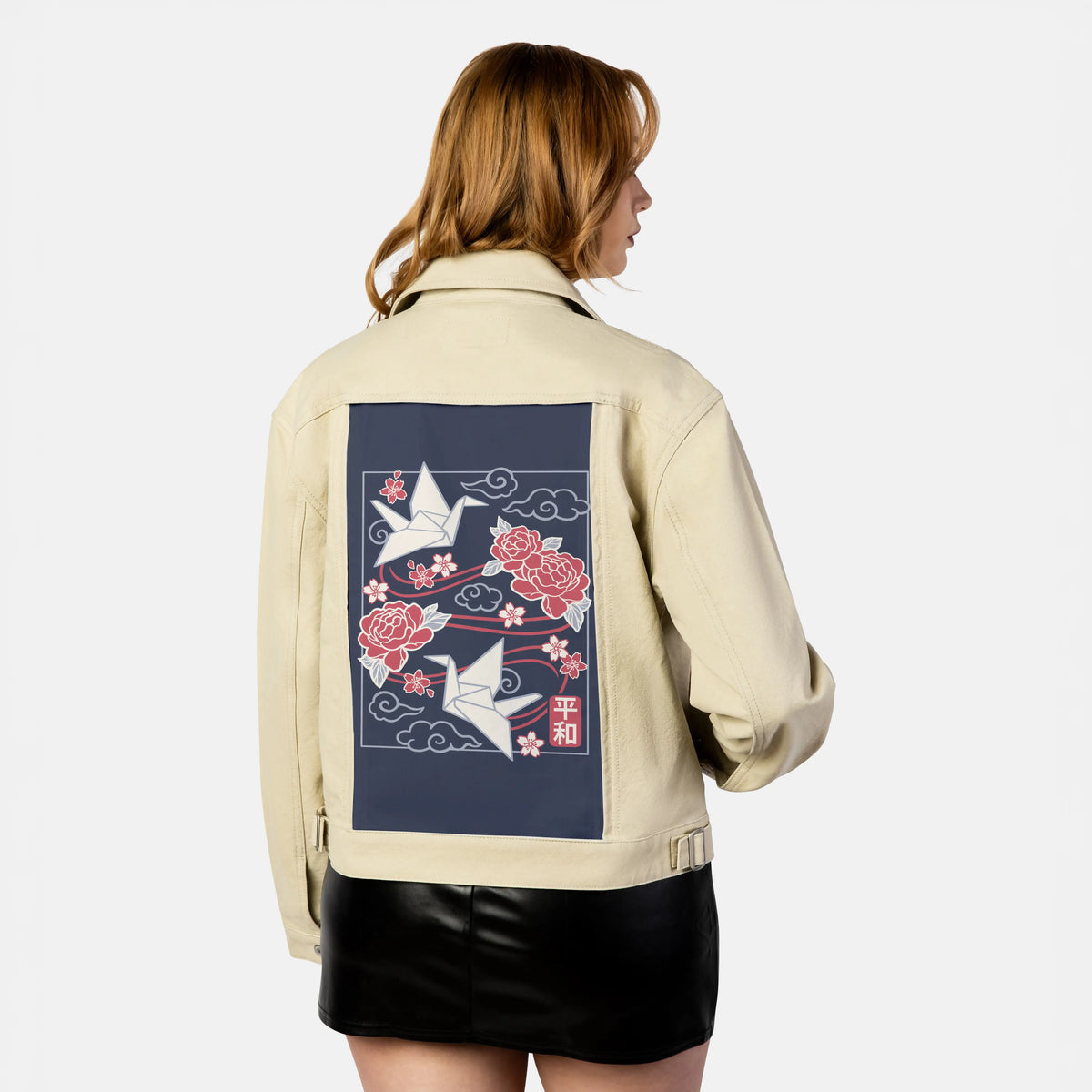 origamicrane patch on female atelier canvas jacket in tan